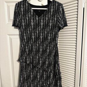 Black and white knee length dress, very pretty for any event.